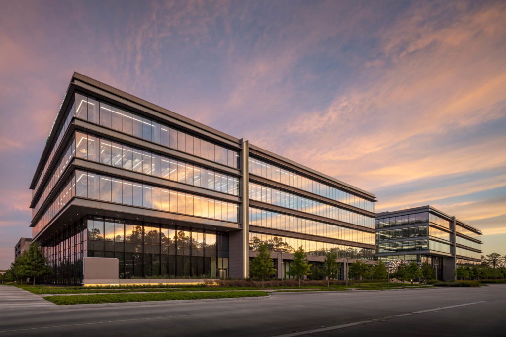 Large corporate office building at dusk