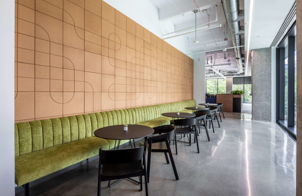 Bench seating with a cork wall background